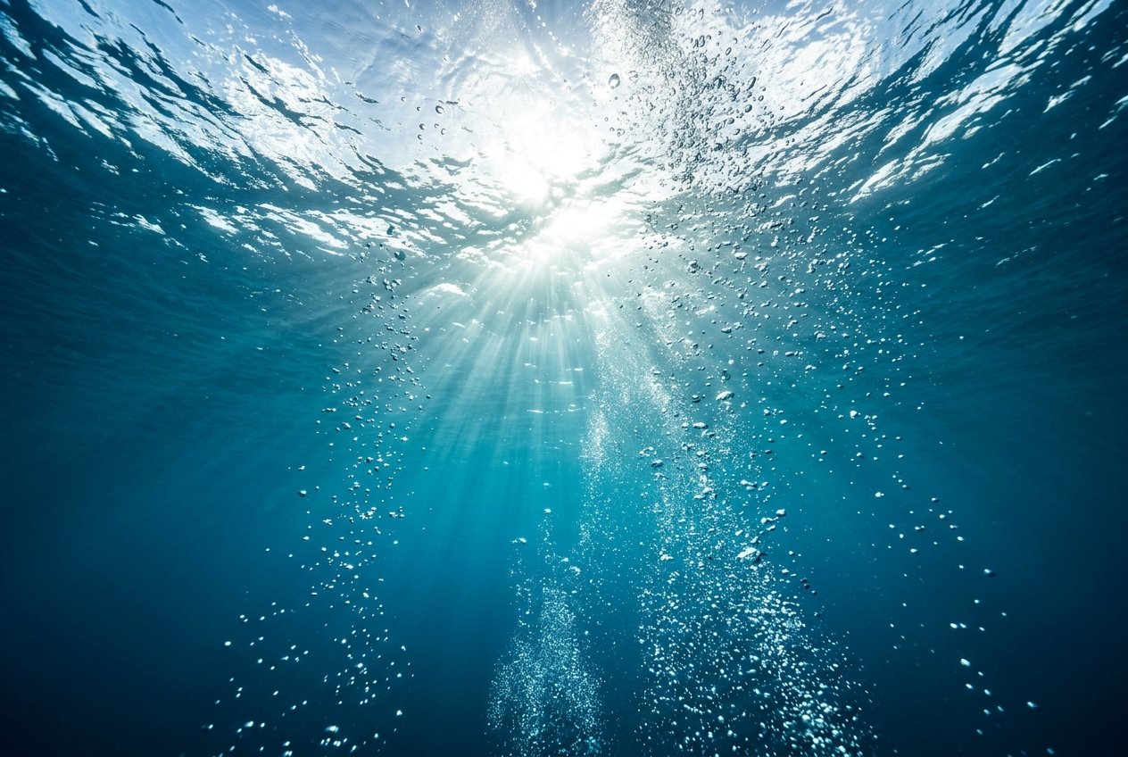 Crystal clear water with rising bubbles